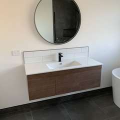 Vanity with round mirror
