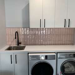 Laundry with pink splashback