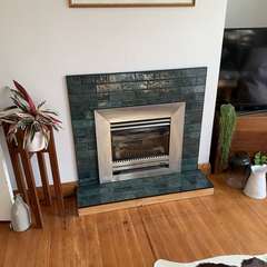 Green brick fireplace