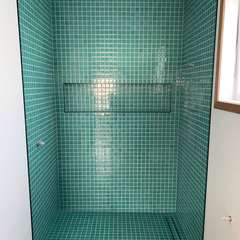 Teal mosaic shower, linear drain