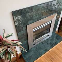 Green brick fireplace, close up