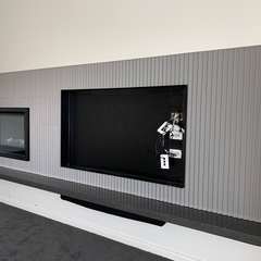 Fluted fireplace and TV wall